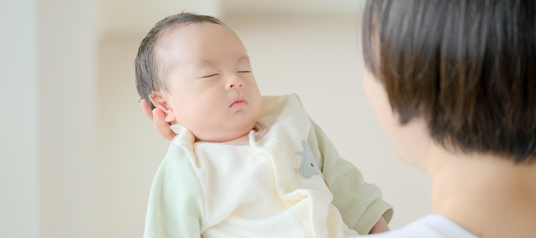 赤ちゃんと家族の写真